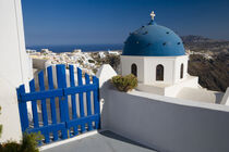 Greek Island of Santorini from the small town of Imerovigli. Blue domed Church.Darrell Gulin / Danita Delimont by Danita Delimont
