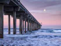 Full moon setting at dawn over Scripps Pier, La Jolla Shores, CA. Ann Collins / Danita Delimont by Danita Delimont