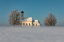 Bavarian church of Raisting with and mist during winter