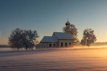 Bavarian church of Raisting during winter and sunset by Bastian Linder
