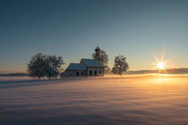 Bavarian church of Raisting during winter sunset by Bastian Linder