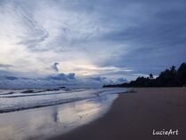 Cloudy beach  by lucieart