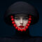 Thonksy-a-red-wool-hat-with-large-balls-on-the-head-of-an-elega-d01a1f28-4290-4d78-98b1-00aebd61ed2a