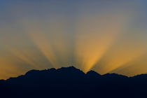 Godrays at sunset over Mount Constance by Ed Book