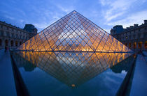 France, Paris.  The Louvre at twilight. Credit as von Danita Delimont