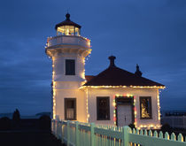 WA, Mukilteo, Mukilteo Lighthouse, established 1906, with holiday lights by Danita Delimont