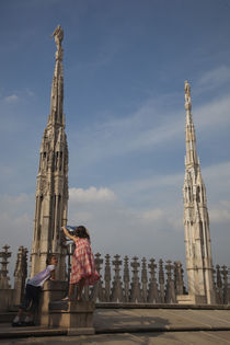 Two girls at an observation point on a cathedral roof von Panoramic Images