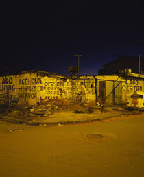 Run-down buildings on a street corner, Brasilia, Brazil by Panoramic Images