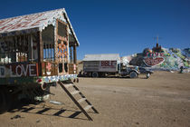 Cultural site near a hill, Salvation Mountain, Imperial County, California, USA by Panoramic Images