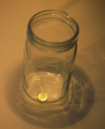 High angle view of a penny in a jar von Panoramic Images