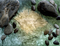 Shiny black stones and pebbles with water drops by Panoramic Images