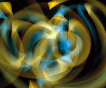 Abstract swirls of blue and gold ribbons of light by Panoramic Images