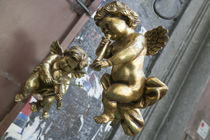 Close-up of two golden cherubs, Naples, Campania, Italy by Panoramic Images