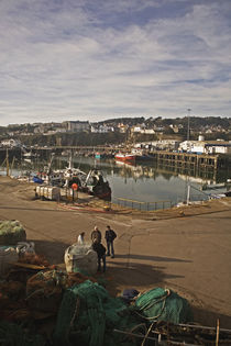 Fishermen in Fishing Harbour, Dunmore east, County Waterford, Ireland by Panoramic Images