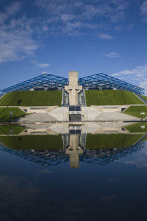 Reflection of a stadium in a pond von Panoramic Images