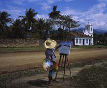 Man painting a church on the roadside von Panoramic Images