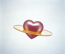 Floating bright pink heart imbedded in center of yellow plate von Panoramic Images