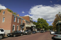 Cars parked on both sides of a road, St. Charles, Missouri, USA by Panoramic Images