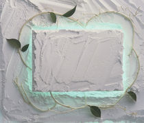 Light grey plaster frame with leaves and aqua tint around center by Panoramic Images