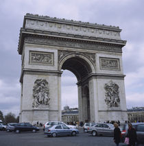 Traffic moving on the road in front of a monument by Panoramic Images
