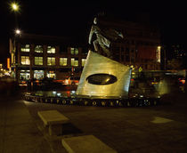 Statue of Adam Clayton Powell Jr at night by Panoramic Images