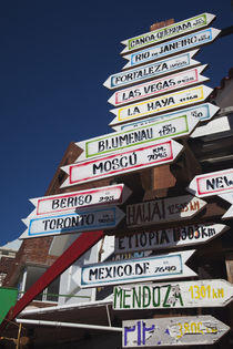 Low angle view of Distance signs