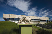 Sculptures of Saber Tooth cat in front of a museum by Panoramic Images