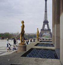 Gilded statue of a woman with a tower in the background von Panoramic Images