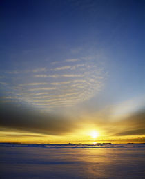 Sunrise through clouds over Newport Bay by Panoramic Images