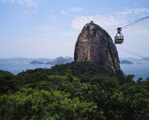 Overhead cable car towards a rock formation by Panoramic Images