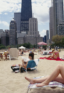 Group of people on the beach, Oak Street Beach, Chicago, Illinois, USA by Panoramic Images