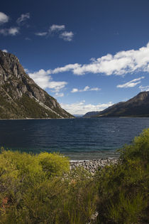 Lake with mountains in the background by Panoramic Images