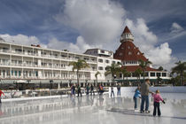 Tourists ice-skating in a hotel von Panoramic Images
