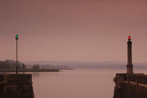 Lighthouse at the lakeside at dawn by Panoramic Images