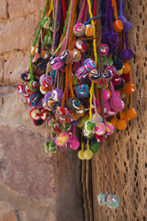 Multi-colored hangings on wall von Panoramic Images