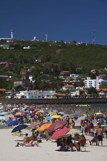 Tourists enjoying on the beach, Playa Piriapolis, Piriapolis, Maldonado, Uruguay von Panoramic Images