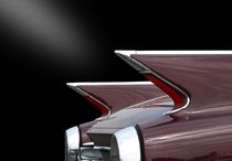 Rear of a classic car (red) by Beate Gube