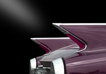 Rear of a classic car (pink) by Beate Gube