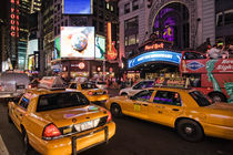 Cabs on Times Square by Stefan Nielsen