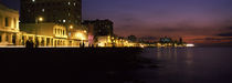 Buildings lit up at the waterfront, Malecon Avenue, Havana, Cuba von Panoramic Images