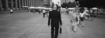 Rear view of a businessman walking on the street, Stuttgart, Germany by Panoramic Images