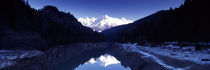 Reflection of snowcapped mountains in water, Dolomites, Cadore, Veneto, Italy von Panoramic Images