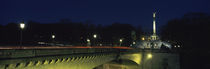 Bridge with a monument lit up at night, Friedensengel, Munich, Bavaria, Germany by Panoramic Images