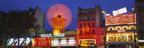 Neon sign in a market lit up at night, Moulin Rouge, Paris, France by Panoramic Images