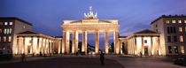 Low angle view of a gate lit up at night, Brandenburg Gate, Berlin, Germany by Panoramic Images