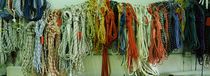 Colorful braided ropes for sailing in a store by Panoramic Images