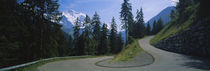 Empty road passing through mountains, Bernese Oberland, Switzerland von Panoramic Images