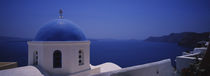 High section view of a church, Oia, Santorini, Greece by Panoramic Images