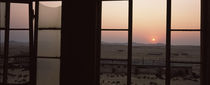 Sunrise viewed through a window, Sperrgebiet, Kolmanskop, Namib Desert, Namibia by Panoramic Images