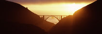Silhouette of a bridge at sunset, Bixby Bridge, Big Sur, California, USA by Panoramic Images